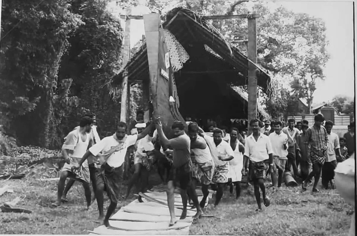 Historic photograph of Nadubhagam Chundan and its community